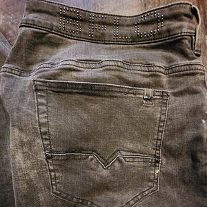 Black Buffalo jeans with zippers on legs